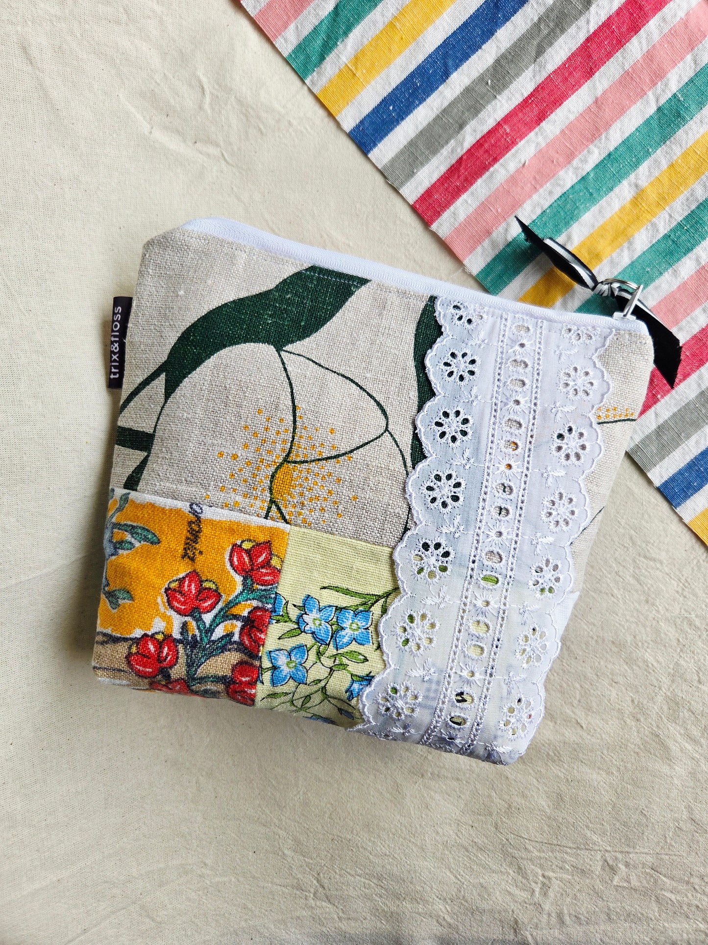 THE HUDDLE REMIX zipper pouch