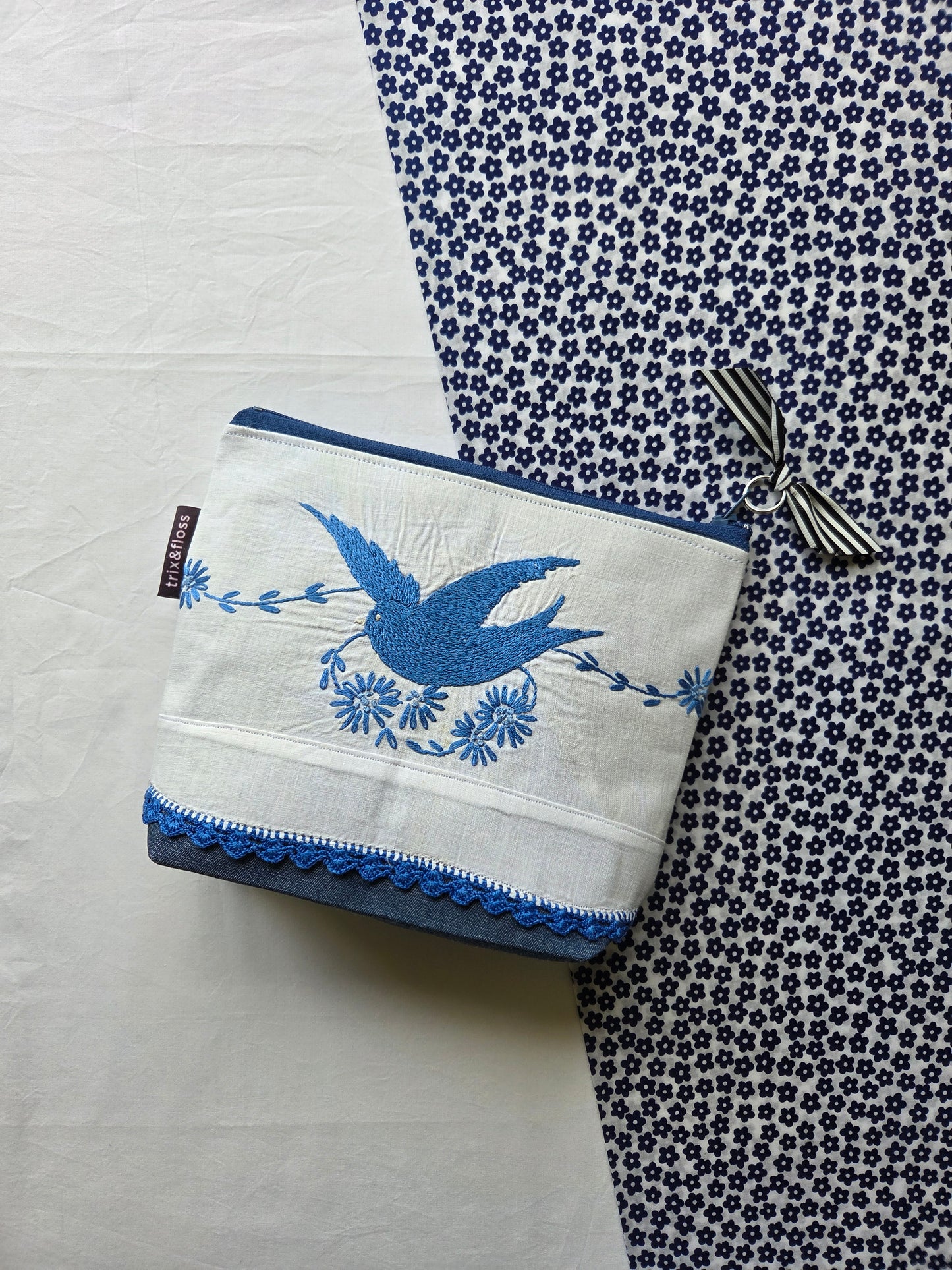 A BIRD IN THE HAND zipper pouch