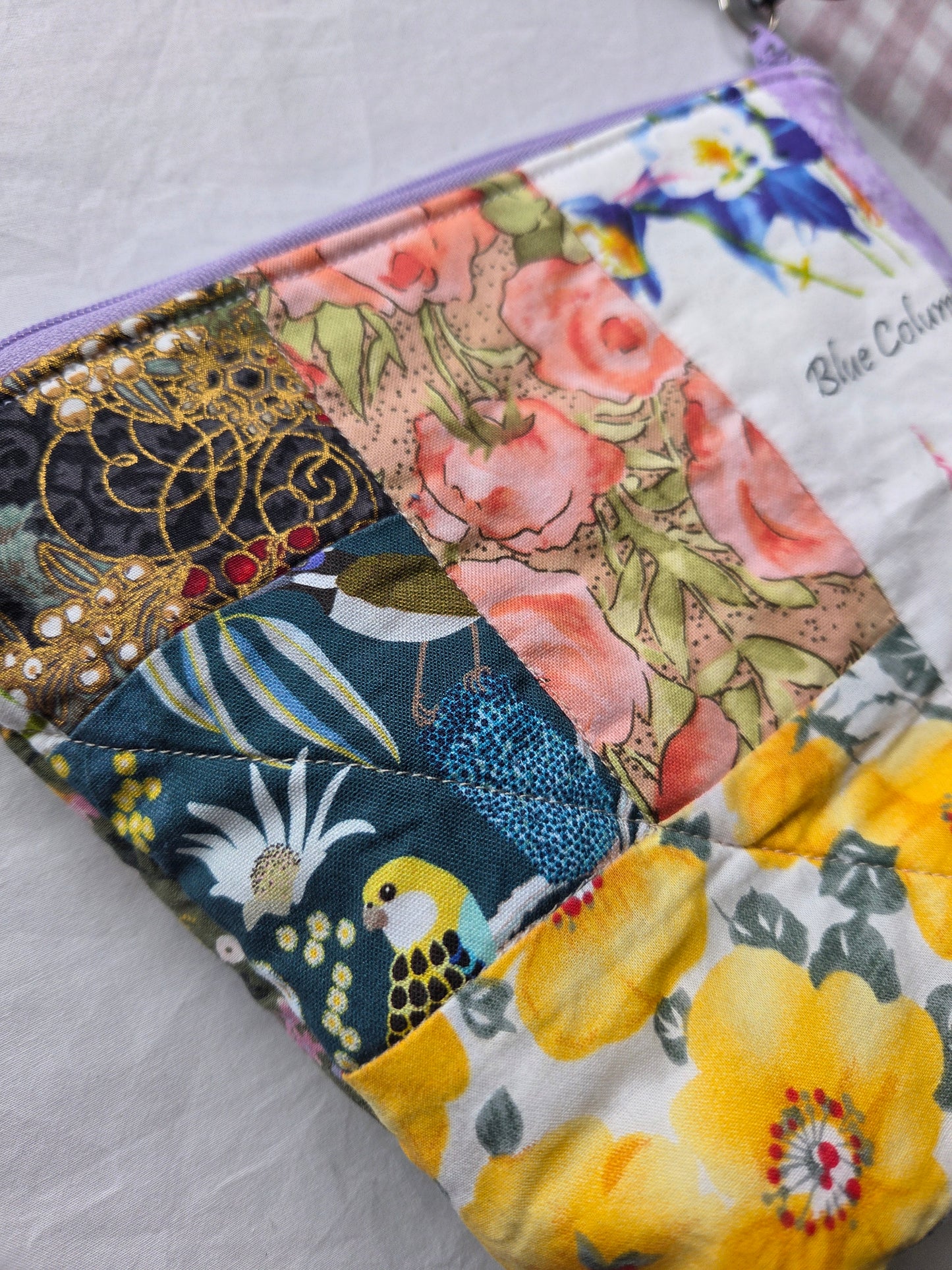 QUILTY AS CHARGED zipper pouch