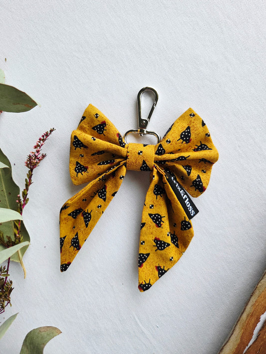 PECKING ORDER bow bag charm